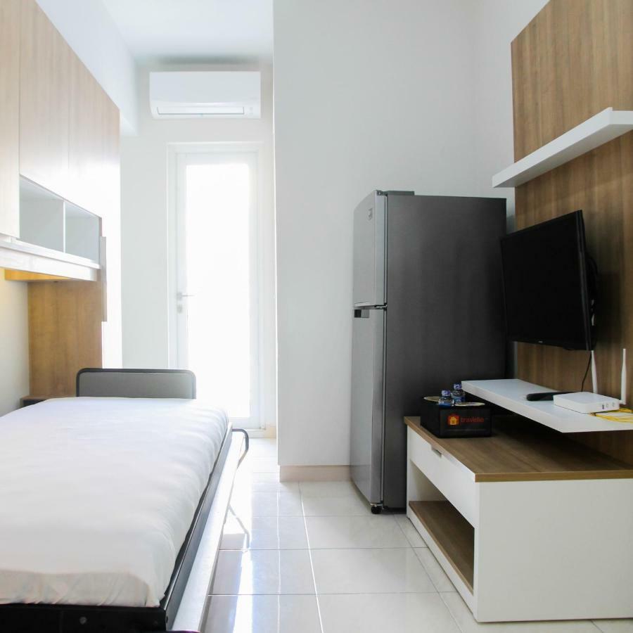 2br With Sofa Bed At Springlake Summarecon By Travelio